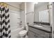 Bathroom featuring granite countertop vanity, shower and tub combo, and toilet at 1211 Croft Dr, Fort Mill, SC 29708