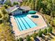 Aerial shot of a community pool with many lanes, sun coverage, and manicured shrubbery at 1211 Croft Dr, Fort Mill, SC 29708