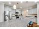 Modern kitchen featuring granite countertops, stainless steel appliances, and gray cabinets at 1211 Croft Dr, Fort Mill, SC 29708