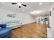 Spacious living room with open floor plan, hardwood floors, and kitchen view at 1211 Croft Dr, Fort Mill, SC 29708