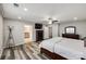 Bright main bedroom with ceiling fan, en suite bathroom, and natural light at 1211 Croft Dr, Fort Mill, SC 29708