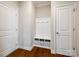 Well-organized mudroom with a built-in bench, hooks, and storage baskets at 1211 Croft Dr, Fort Mill, SC 29708
