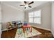 Playroom with hardwood floors, a ceiling fan, and a window providing natural light at 1211 Croft Dr, Fort Mill, SC 29708