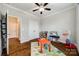 Bright playroom with hardwood floors, a ceiling fan, and a closet for storage at 1211 Croft Dr, Fort Mill, SC 29708