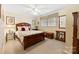 Cozy bedroom with a comfortable bed, carpet, and a ceiling fan at 1228 Graystone Dr, Gastonia, NC 28054