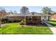 Charming brick home with manicured lawn and inviting curb appeal at 1228 Graystone Dr, Gastonia, NC 28054