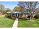 Classic brick home with a welcoming front porch and mature landscaping at 1228 Graystone Dr, Gastonia, NC 28054