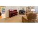 Cozy living room featuring two pianos, comfortable seating, and natural light at 1228 Graystone Dr, Gastonia, NC 28054