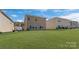 A spacious backyard with a lush lawn, perfect for outdoor activities and entertaining at 126 Johns Cardinal Dr, Mooresville, NC 28115