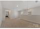 Bright bonus room featuring neutral finishes, perfect for a versatile living space at 126 Johns Cardinal Dr, Mooresville, NC 28115