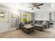 Bright living room features neutral tones, a large sectional sofa, and abundant natural light at 1301 Jackson St, Kannapolis, NC 28083