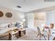 Bright living room featuring a white sofa, neutral walls, and stylish decor at 160 Mountain Bridge Way, Statesville, NC 28625