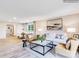 Inviting living area featuring comfortable seating, modern decor, and an open layout to the dining space at 160 Mountain Bridge Way, Statesville, NC 28625