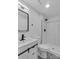 Modern bathroom with subway tiled shower and black fixtures at 1814 Eastway Dr, Charlotte, NC 28205