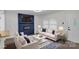 Bright living room features a modern fireplace, sleek flooring, and stylish furniture arrangement at 1814 Eastway Dr, Charlotte, NC 28205