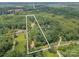 Aerial view of a beautiful property surrounded by lush greenery with marked boundaries at 217 Blossom Hill Rd, Lincolnton, NC 28092