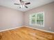 Serene bedroom featuring hardwood floors, natural light, and neutral tones at 217 Blossom Hill Rd, Lincolnton, NC 28092