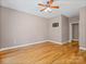 Bedroom with hardwood flooring, neutral walls, and a ceiling fan at 217 Blossom Hill Rd, Lincolnton, NC 28092