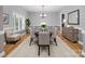 Virtual staging of a dining room with neutral colors and modern furnishings at 217 Blossom Hill Rd, Lincolnton, NC 28092