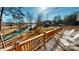 Expansive wooden deck overlooking waterfront view, perfect for outdoor relaxation and enjoying nature at 22970 Lake Tillery Rd, Albemarle, NC 28001