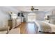 Spacious primary bedroom featuring an elegant dresser and a large window for ample natural light at 22970 Lake Tillery Rd, Albemarle, NC 28001