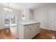 Open dining area with bright lighting and access to the outdoor living space at 2620 Merion Hills Ct, Charlotte, NC 28269