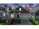 Charming home exterior features a well-maintained lawn and inviting entryway at 2620 Merion Hills Ct, Charlotte, NC 28269