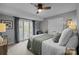 Comfortable bedroom featuring a ceiling fan, carpet flooring, and sliding glass doors to the outside at 27 Heritage Ct, Lake Wylie, SC 29710