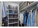Walk-in closet with shelving and hanging racks, providing ample storage space for clothes and accessories at 27 Heritage Ct, Lake Wylie, SC 29710