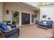 Inviting front porch seating area with stylish furnishings, creating a cozy outdoor living space at 27 Heritage Ct, Lake Wylie, SC 29710