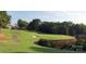 Picturesque golf course with lush green fairways and scenic waterfront views at 27 Heritage Ct, Lake Wylie, SC 29710