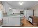 Bright kitchen features white appliances and plenty of cabinet space at 28120 Ryan Rd, Richfield, NC 28137
