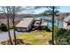 Charming waterfront home with stone accents, mature trees, and a two-car garage at 343 River Haven Dr, Taylorsville, NC 28681