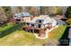 Backyard featuring a two-story deck overlooking the lawn with lake access at 343 River Haven Dr, Taylorsville, NC 28681