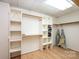 Spacious walk-in closet featuring custom shelving, and ample storage for an organized wardrobe at 343 River Haven Dr, Taylorsville, NC 28681