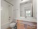 Bathroom including a tub, toilet, and vanity with mirror at 3939 Picasso Ct, Charlotte, NC 28205