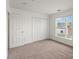 Bedroom featuring a closet and a window with blinds at 3939 Picasso Ct, Charlotte, NC 28205