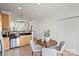 Well-lit kitchen and breakfast nook with tile flooring, stainless steel appliances, and ample counter space at 3939 Picasso Ct, Charlotte, NC 28205