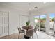 Breakfast nook area with tile floors, natural light, a sliding glass door, and access to an outdoor space at 3939 Picasso Ct, Charlotte, NC 28205