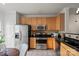 Eat-in kitchen with stainless steel appliances, granite counters, and plenty of cabinet storage at 3939 Picasso Ct, Charlotte, NC 28205