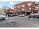 Street view of a multi-story building with storefronts at 3939 Picasso Ct, Charlotte, NC 28205