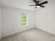 Bedroom with carpet and window overlooking trees at 450 Tot Dellinger Rd, Cherryville, NC 28021