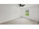 Bedroom with plush carpet, large window, and a modern ceiling fan at 450 Tot Dellinger Rd, Cherryville, NC 28021