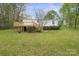 Charming home with a large deck, well-maintained lawn, and mature landscaping at 450 Tot Dellinger Rd, Cherryville, NC 28021