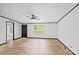 A spacious living room with neutral walls, modern flooring, and an updated ceiling fan at 450 Tot Dellinger Rd, Cherryville, NC 28021