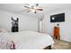 Bedroom featuring a ceiling fan, spacious closet, and ample natural light at 4919 Manchineel Ln, Monroe, NC 28110
