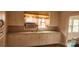 Bright kitchen with light cabinets, a vintage sink, and a window at 502 And 504 Church St, Belmont, NC 28012