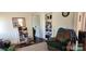 Cozy living room with a bookshelf, doorway, and chair at 502 And 504 Church St, Belmont, NC 28012