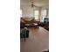 Inviting living room with bright windows, plush seating, and carpet floors at 502 And 504 Church St, Belmont, NC 28012