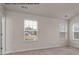 Spacious bedroom offers large windows with great views and neutral carpeting at 505 Mt. Mitchell Ave # 505, Gastonia, NC 28052